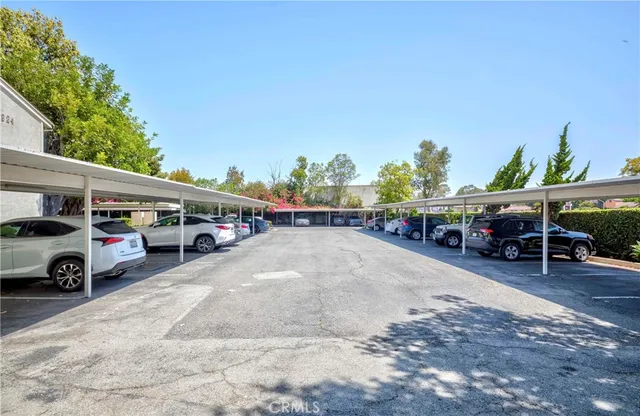 a view of a street with cars