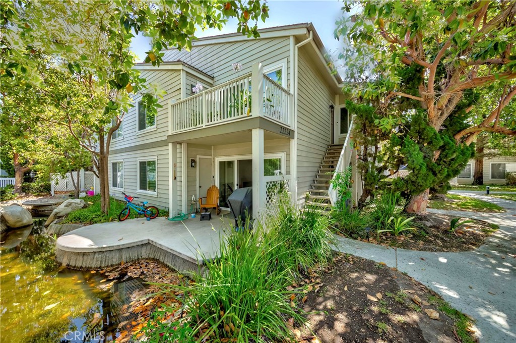 22224 South Vermont Avenue, Unit 102C Torrance, CA 90502 - Photo 5 of 27 a view of a house with backyard