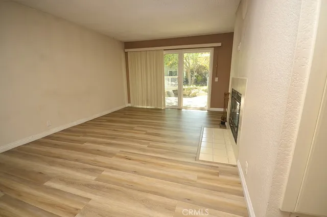 a view of an empty room and window
