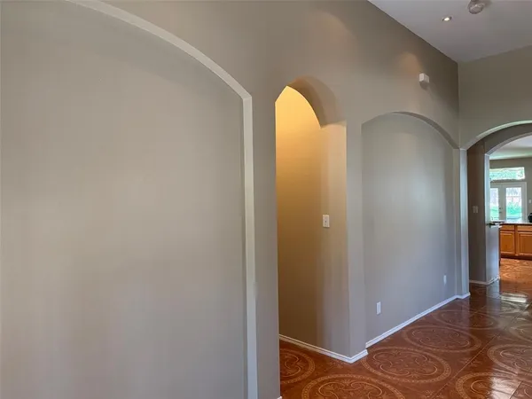a view of an entryway with a workspace