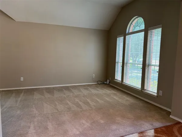 an empty room with window