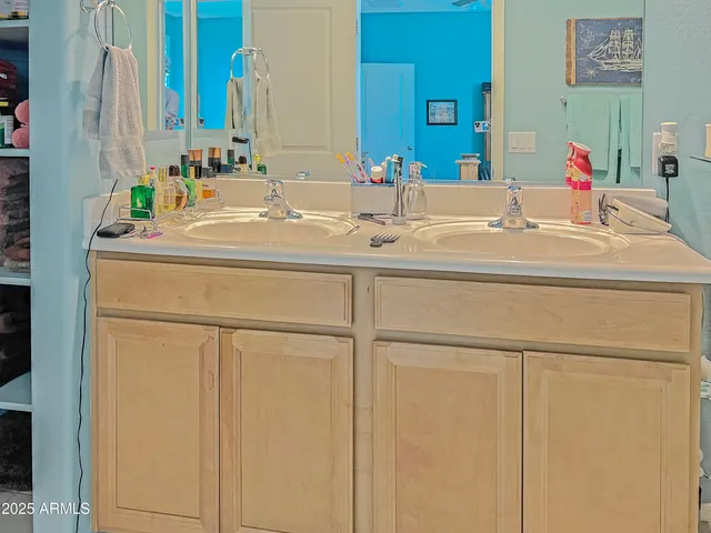 a bathroom with a sink and toilet