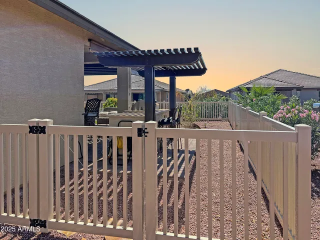 a view of balcony with furniture