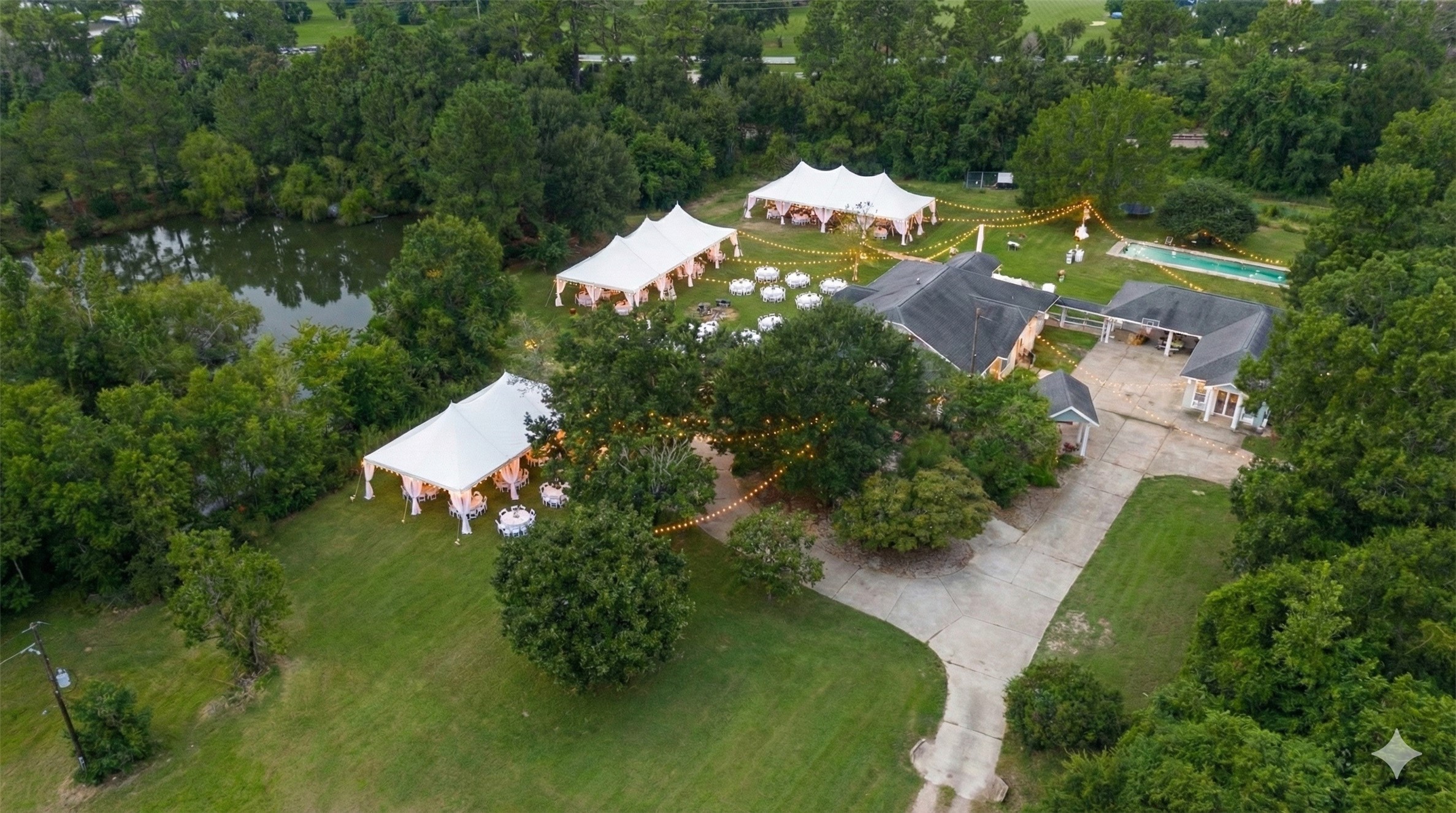 38011 Spur 149 Road Magnolia, TX 77354 - Photo 43 of 50 Here's a helpful idea for setting up the property for a wedding or party. You'll find plenty of space in front of the property, making everything convenient and enjoyable for guests, and lots of ample parking.