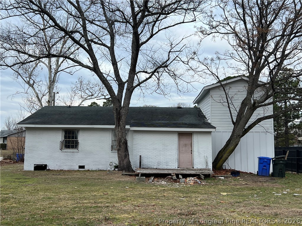2024 Shaw Road Fayetteville, NC 28311 - Photo 3 of 3 a view of a backyard with a large tree