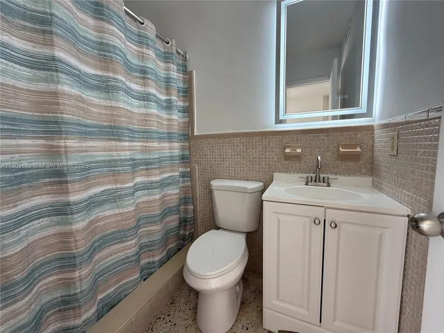 a view of a backyard of the house