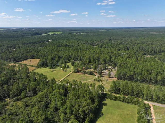a view of a lake with a yard