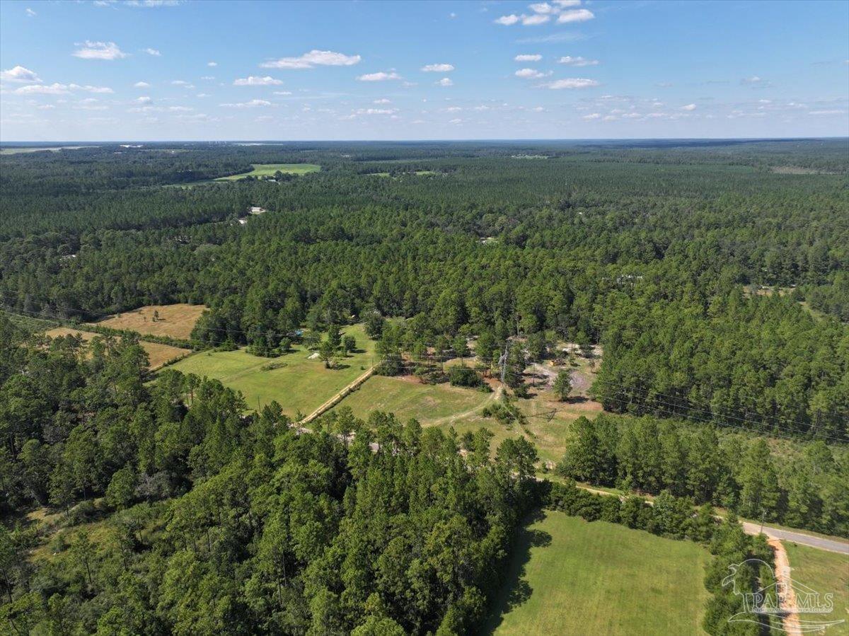 8330 Edith Avenue Milton, FL 32570 - Photo 7 of 19 a view of a lake with green space