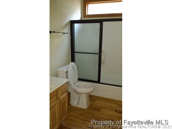 2341 Zacks Mill Road Angier, NC 27501 - Photo 17 of 25 a bathroom with a toilet and a shower
