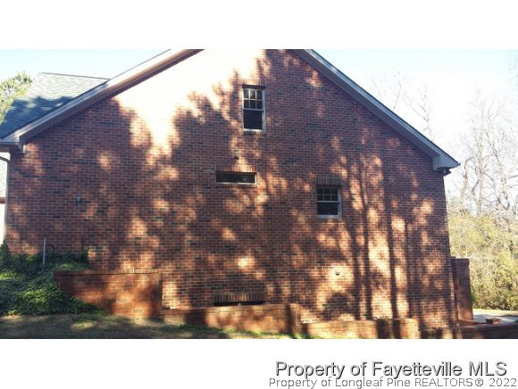 2341 Zacks Mill Road Angier, NC 27501 - Photo 5 of 25 a black and white view of a backyard