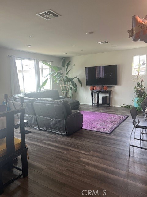 29901 Bridlegate Way Menifee, CA 92584 - Photo 9 of 43 a living room with furniture and a flat screen tv