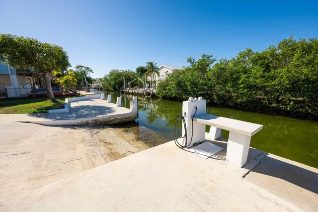a view of a lake with a patio