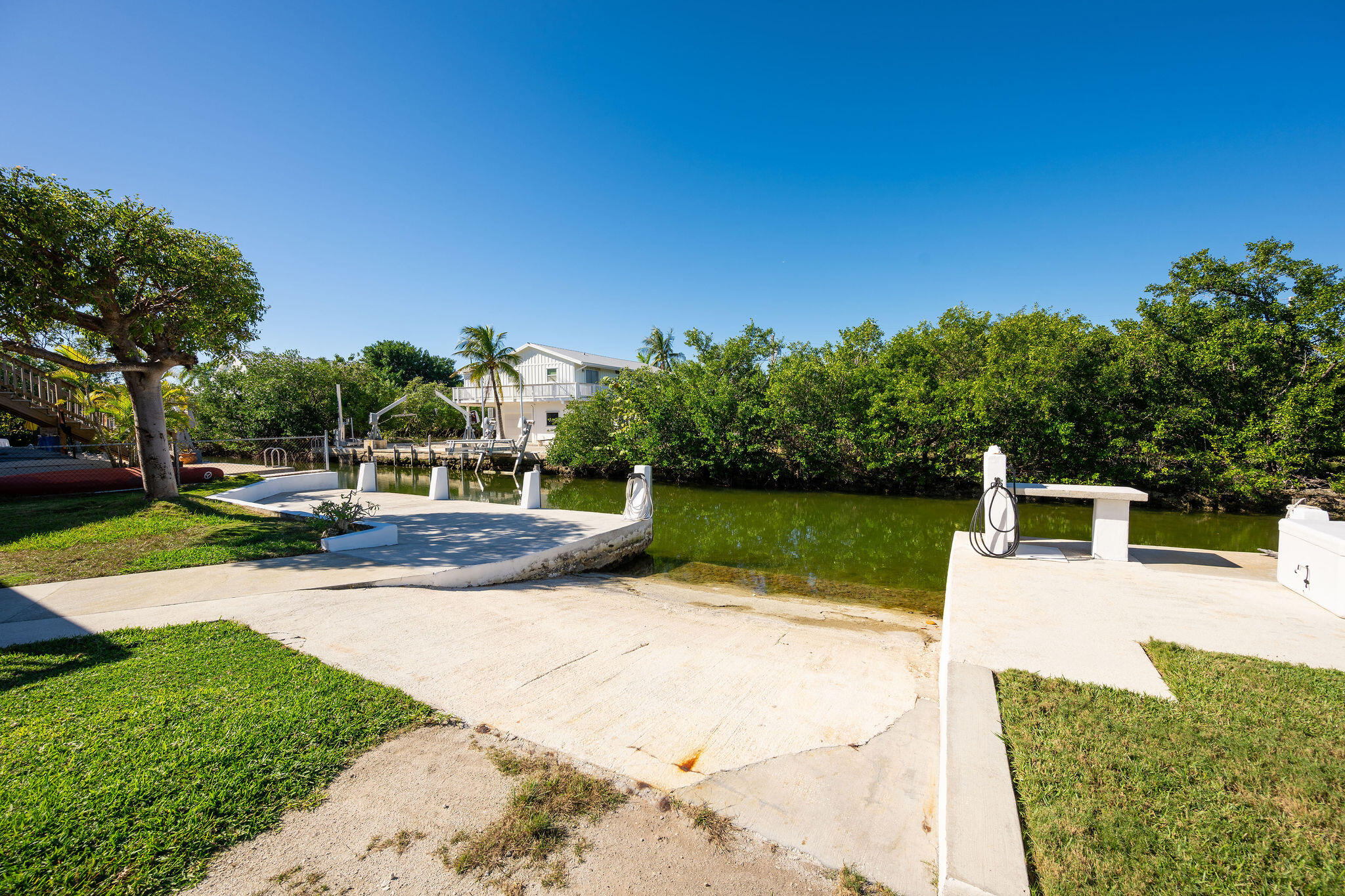 3856 Donna Road Big Pine Key, FL 33043 - Photo 25 of 28 a view of a swimming pool with a patio