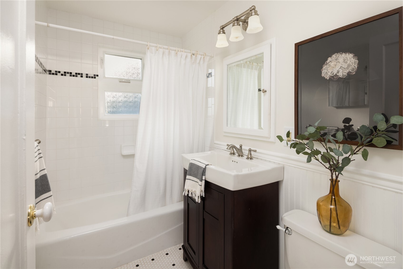 5230 242nd Street Southwest Mountlake Terrace, WA 98043 - Photo 12 of 39 a bathroom with a sink a toilet and a bathtub