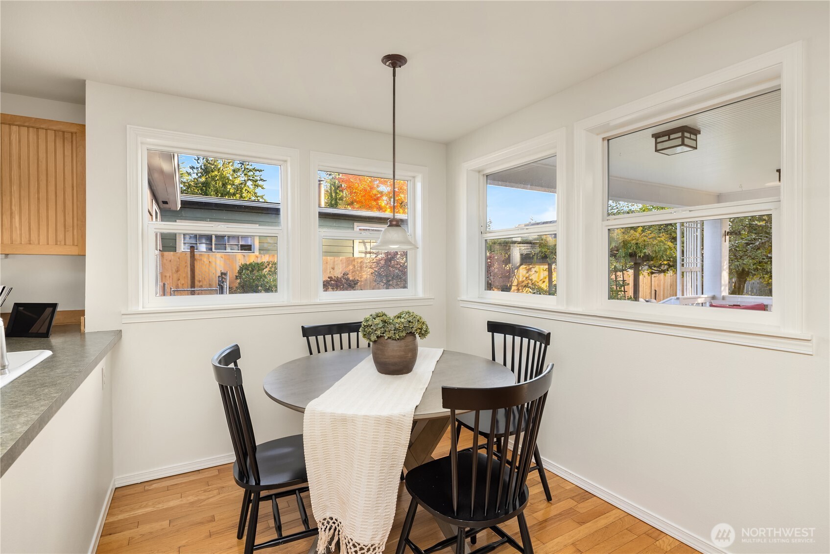 5230 242nd Street Southwest Mountlake Terrace, WA 98043 - Photo 19 of 39 a view of a dining room with furniture window and outside view