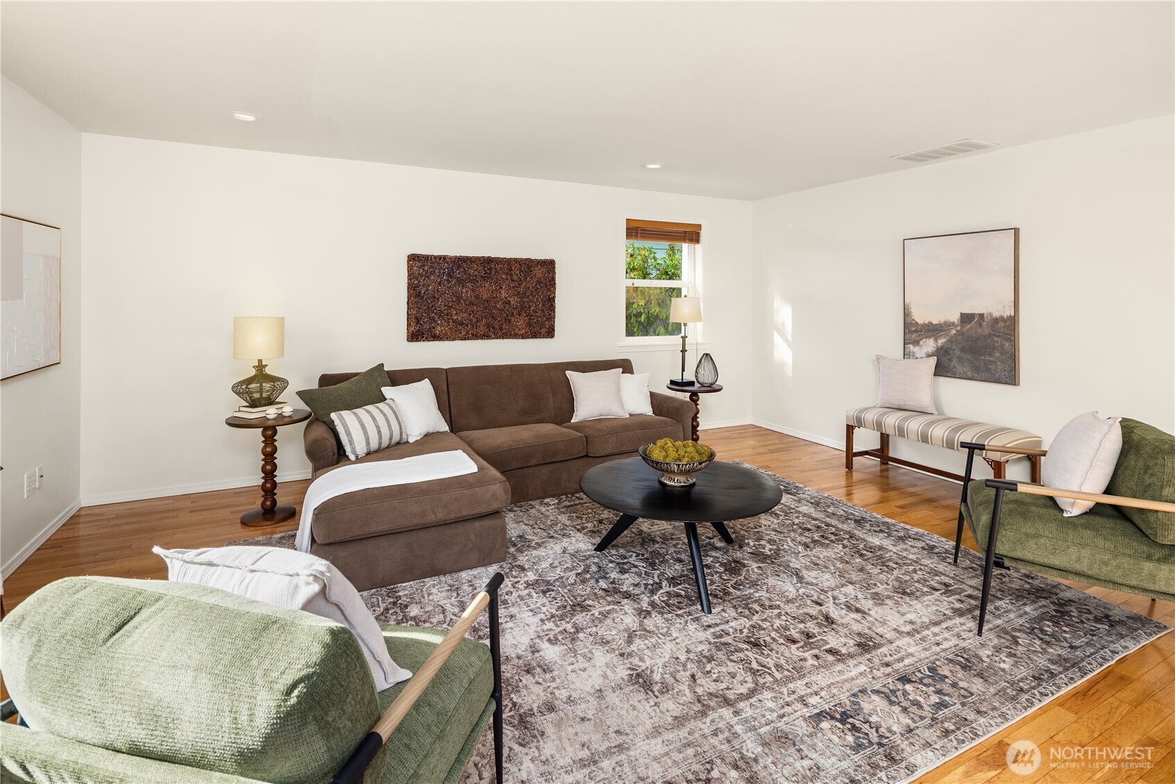 5230 242nd Street Southwest Mountlake Terrace, WA 98043 - Photo 24 of 39 a living room with furniture and a rug