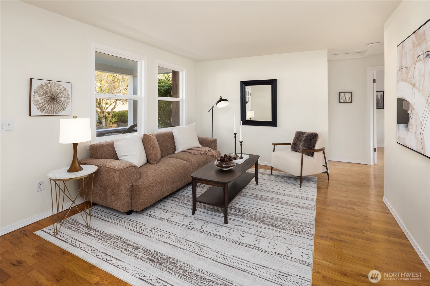 5230 242nd Street Southwest Mountlake Terrace, WA 98043 - Photo 3 of 39 a living room with furniture and a wooden floor