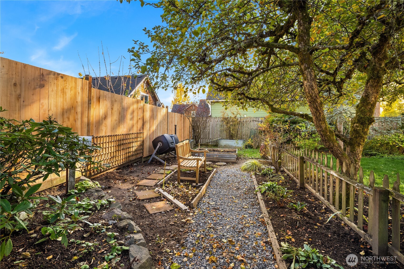 5230 242nd Street Southwest Mountlake Terrace, WA 98043 - Photo 31 of 39 a backyard of a house with lots of green space