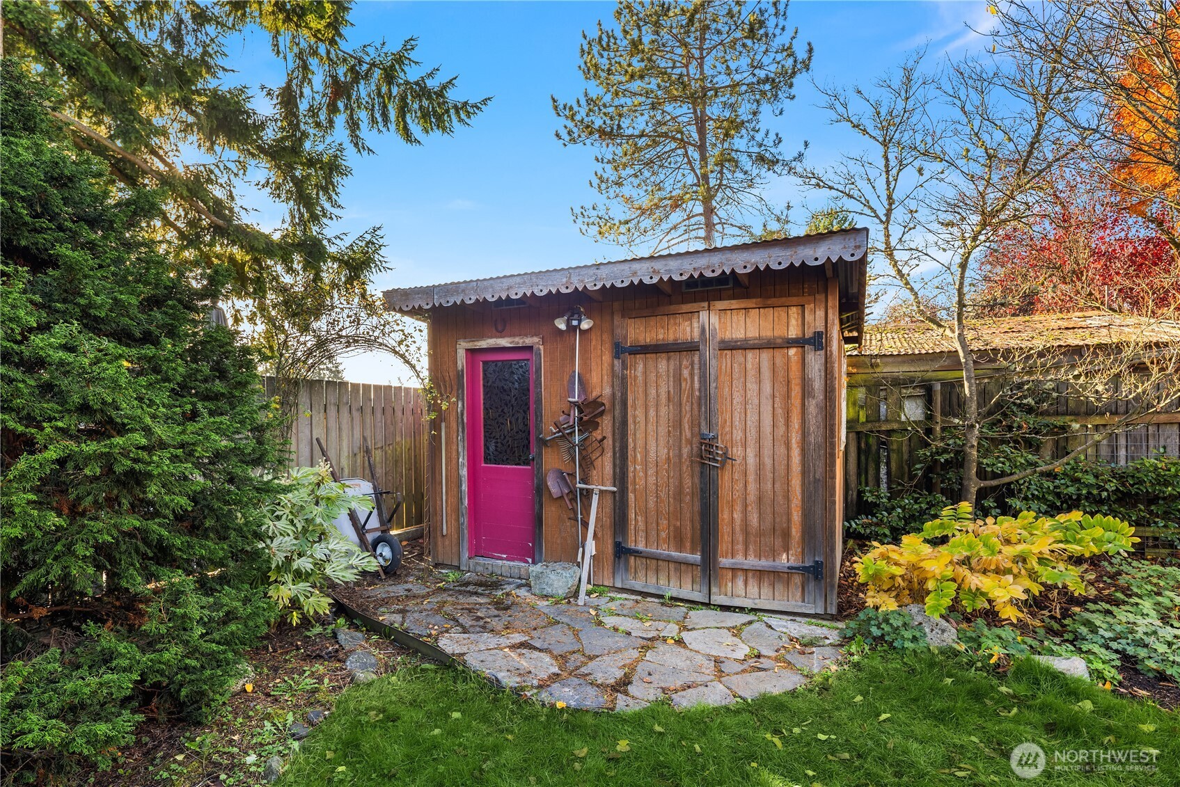 5230 242nd Street Southwest Mountlake Terrace, WA 98043 - Photo 34 of 39 a view of backyard with wooden fence and large trees