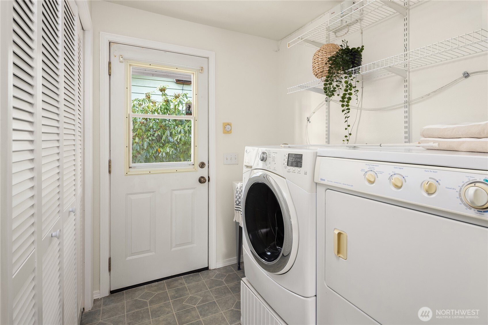 5230 242nd Street Southwest Mountlake Terrace, WA 98043 - Photo 36 of 39 a utility room with dryer and washer