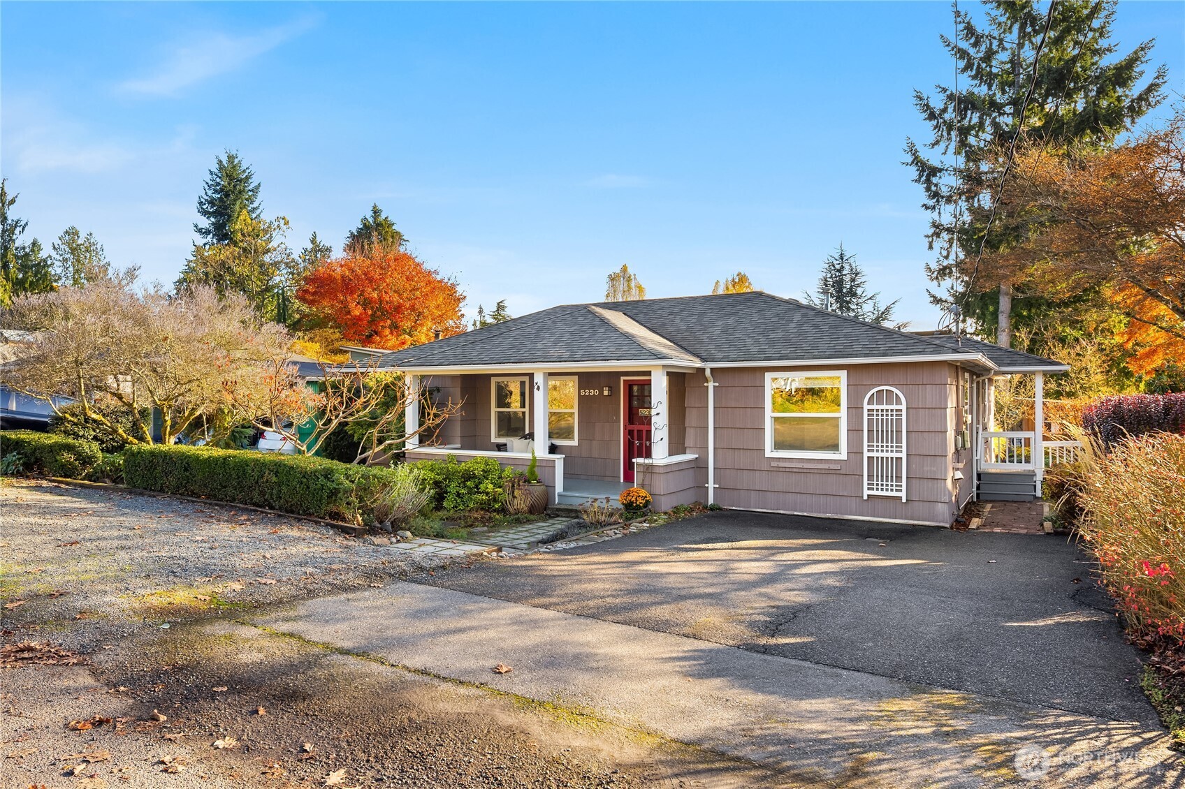 5230 242nd Street Southwest Mountlake Terrace, WA 98043 - Photo 39 of 39 a front view of a house with a yard