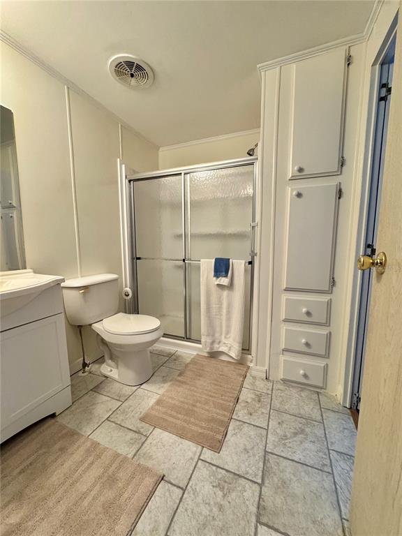 340 Peace Manor Palmetto, FL 34221 - Photo 21 of 38 a bathroom with a toilet and a shower
