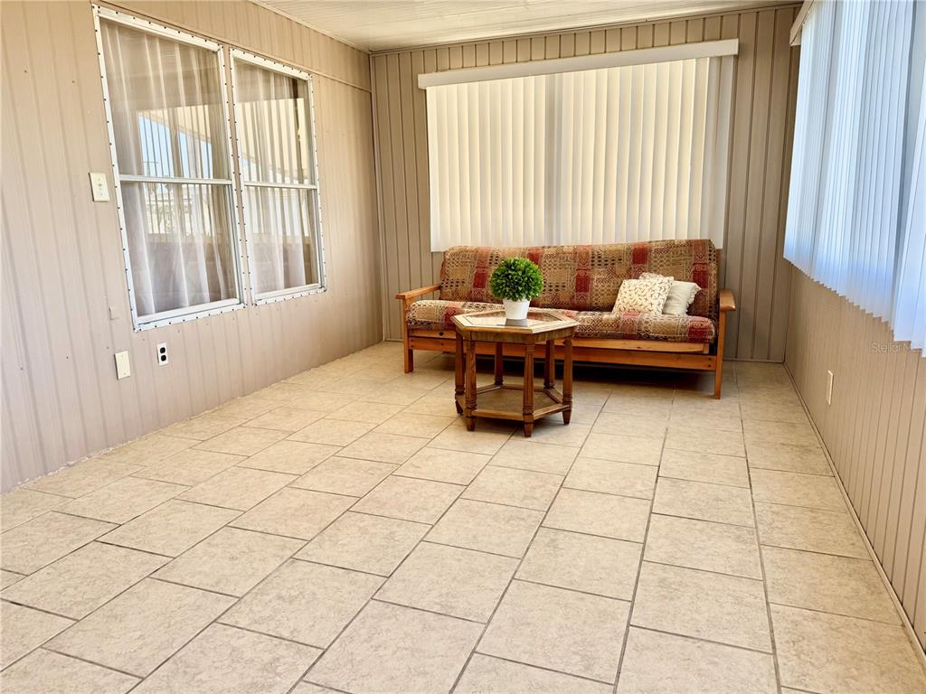 340 Peace Manor Palmetto, FL 34221 - Photo 3 of 38 a living room with furniture and a window