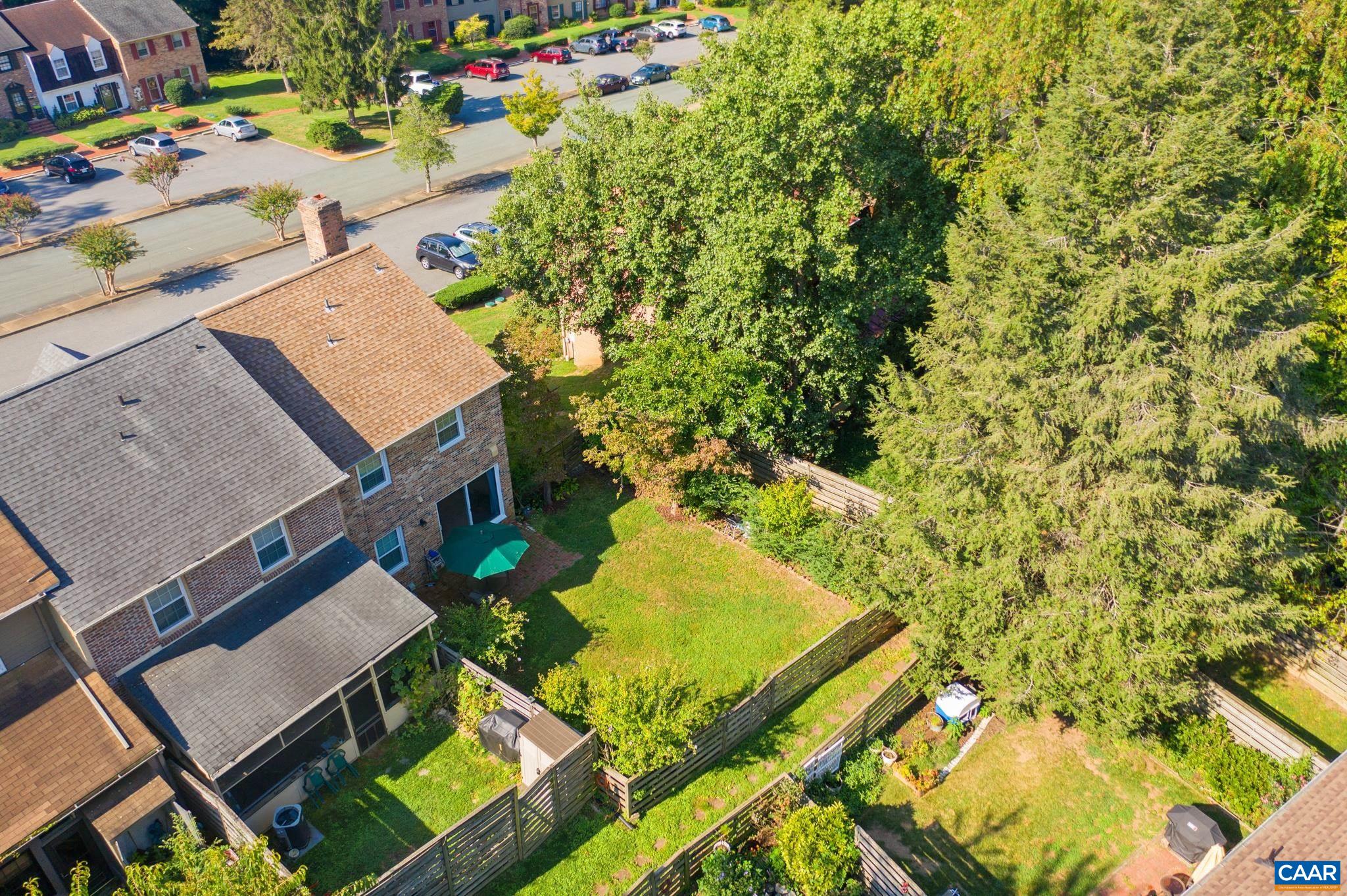 114 Georgetown Green Charlottesville, VA 22901 - Photo 3 of 44 an aerial view of a house with a yard and swimming pool