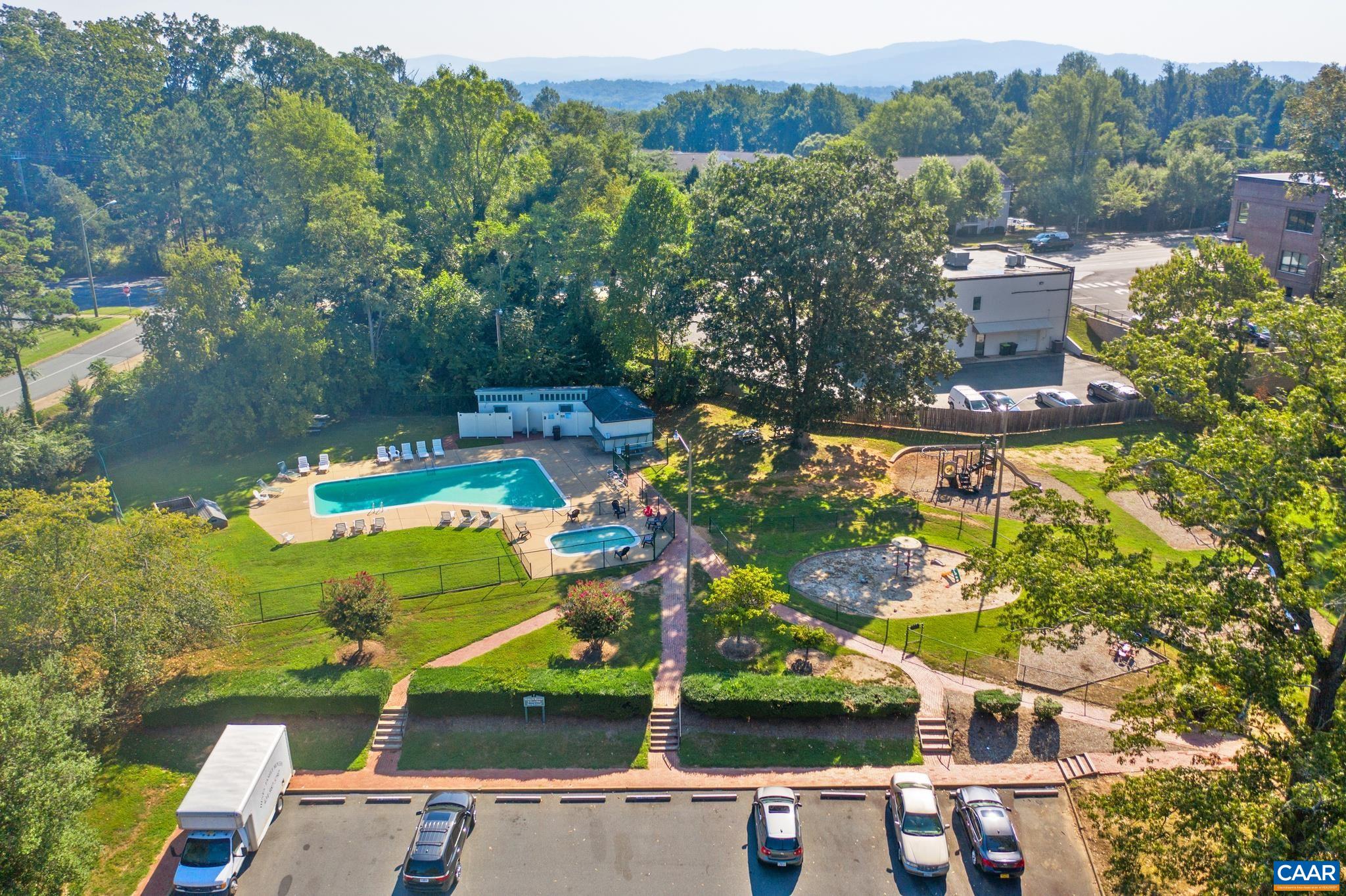 114 Georgetown Green Charlottesville, VA 22901 - Photo 35 of 44 an aerial view of a house with a garden and lake view