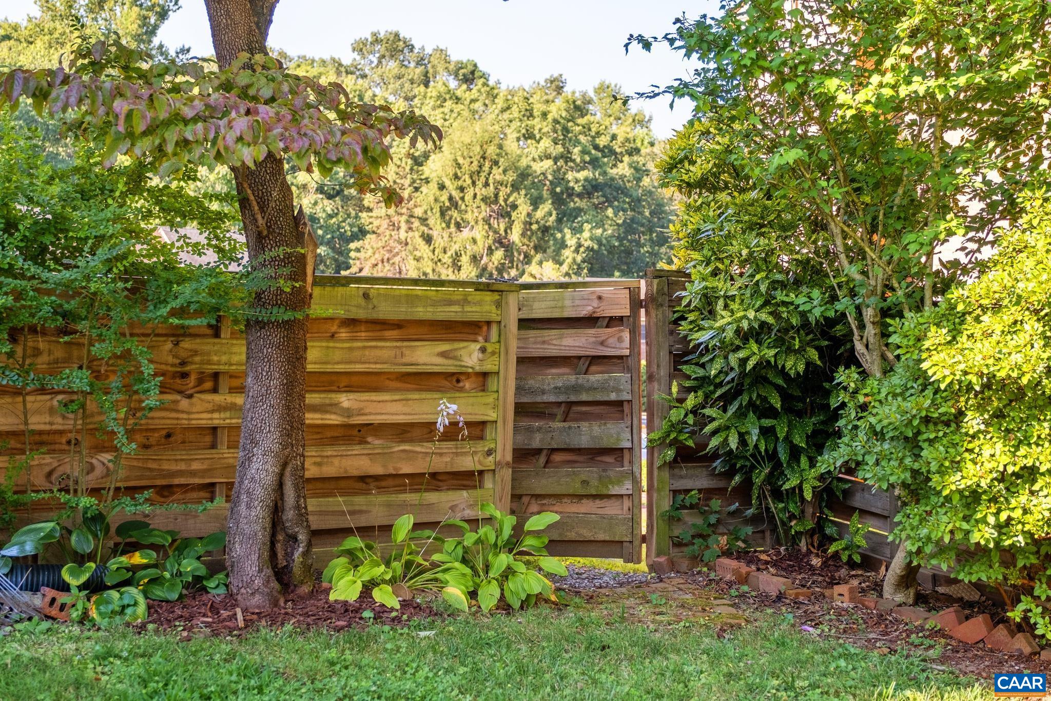 114 Georgetown Green Charlottesville, VA 22901 - Photo 44 of 44 a view of a wooden fence and trees