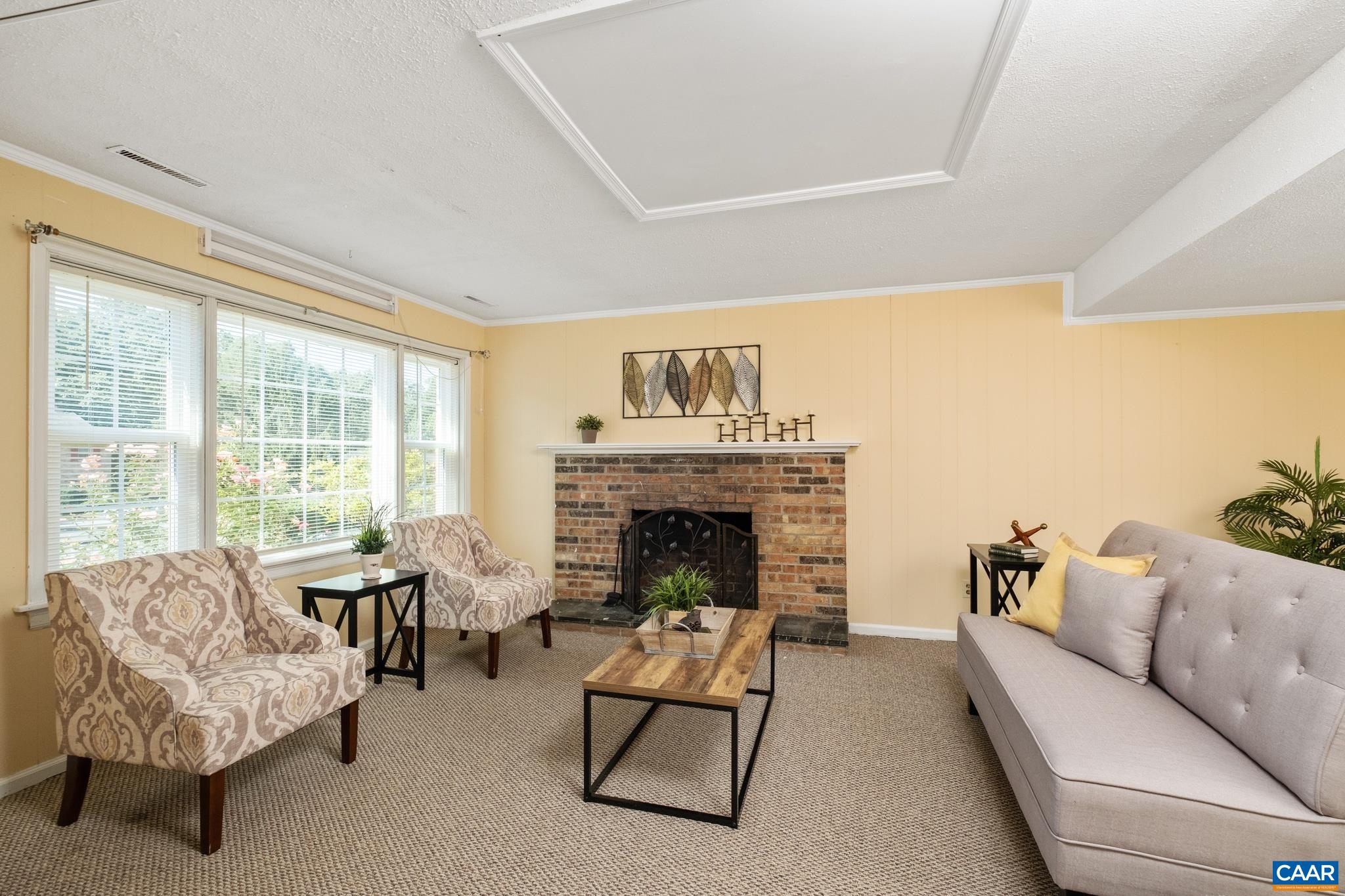 114 Georgetown Green Charlottesville, VA 22901 - Photo 8 of 44 a living room with furniture and a fireplace