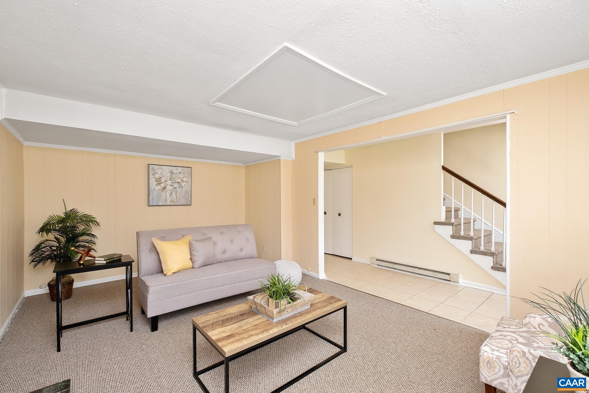 114 Georgetown Green Charlottesville, VA 22901 - Photo 9 of 44 a living room with furniture and a wooden floor