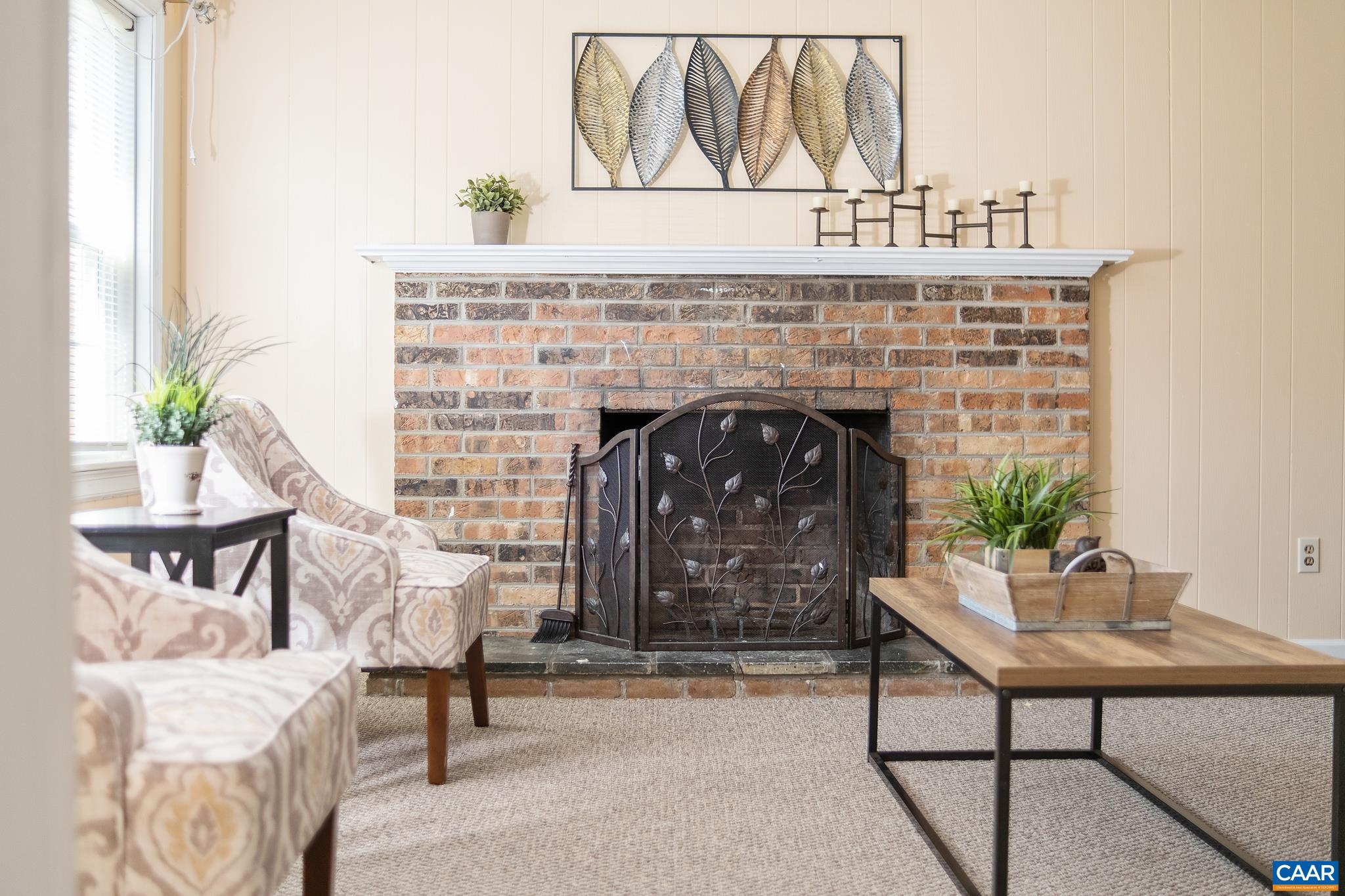 114 Georgetown Green Charlottesville, VA 22901 - Photo 10 of 44 a living room with furniture and a fireplace