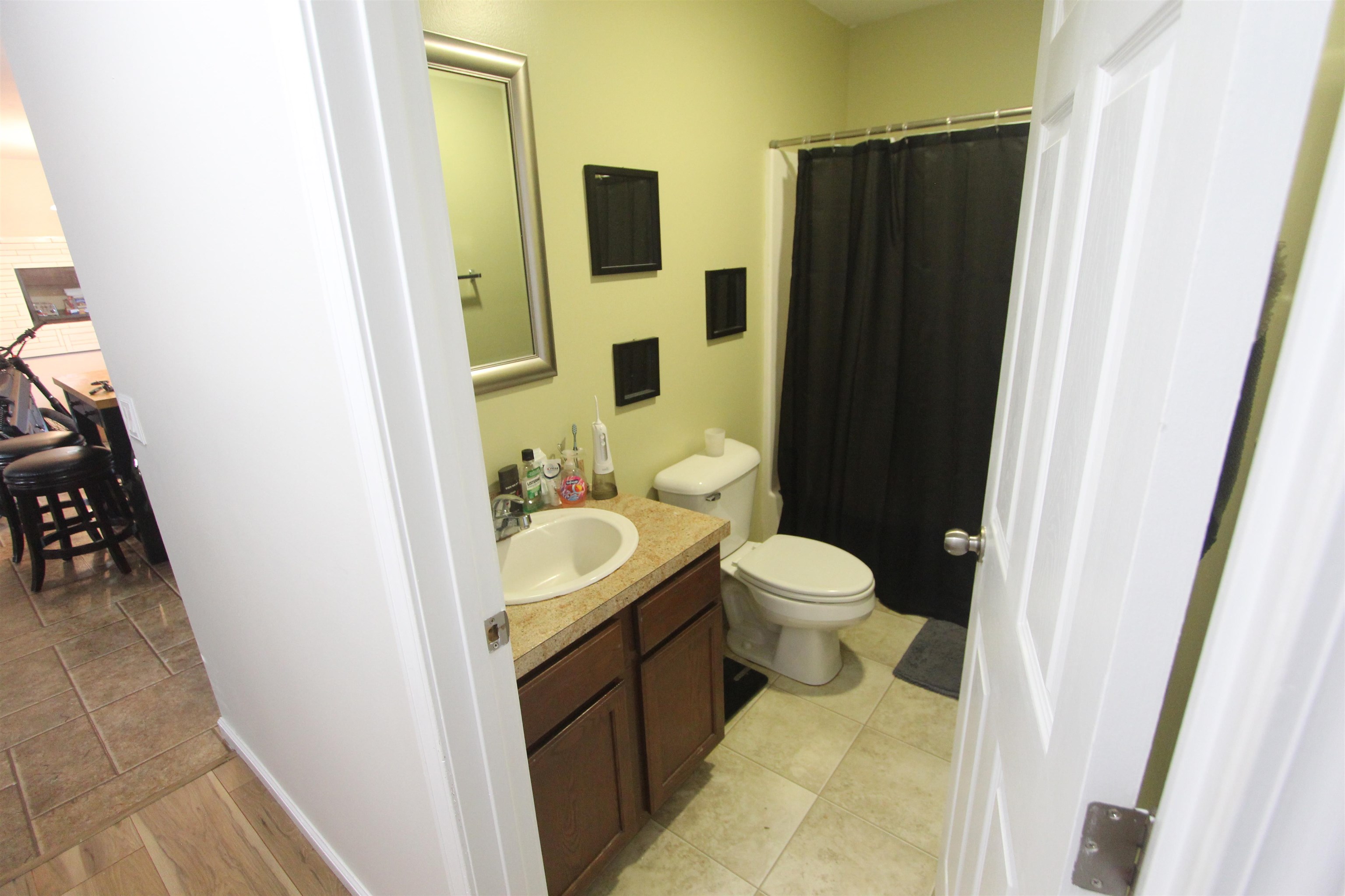 972 Tecumseh Road Erma, NJ 08204 - Photo 26 of 30 a bathroom with a sink and a mirror