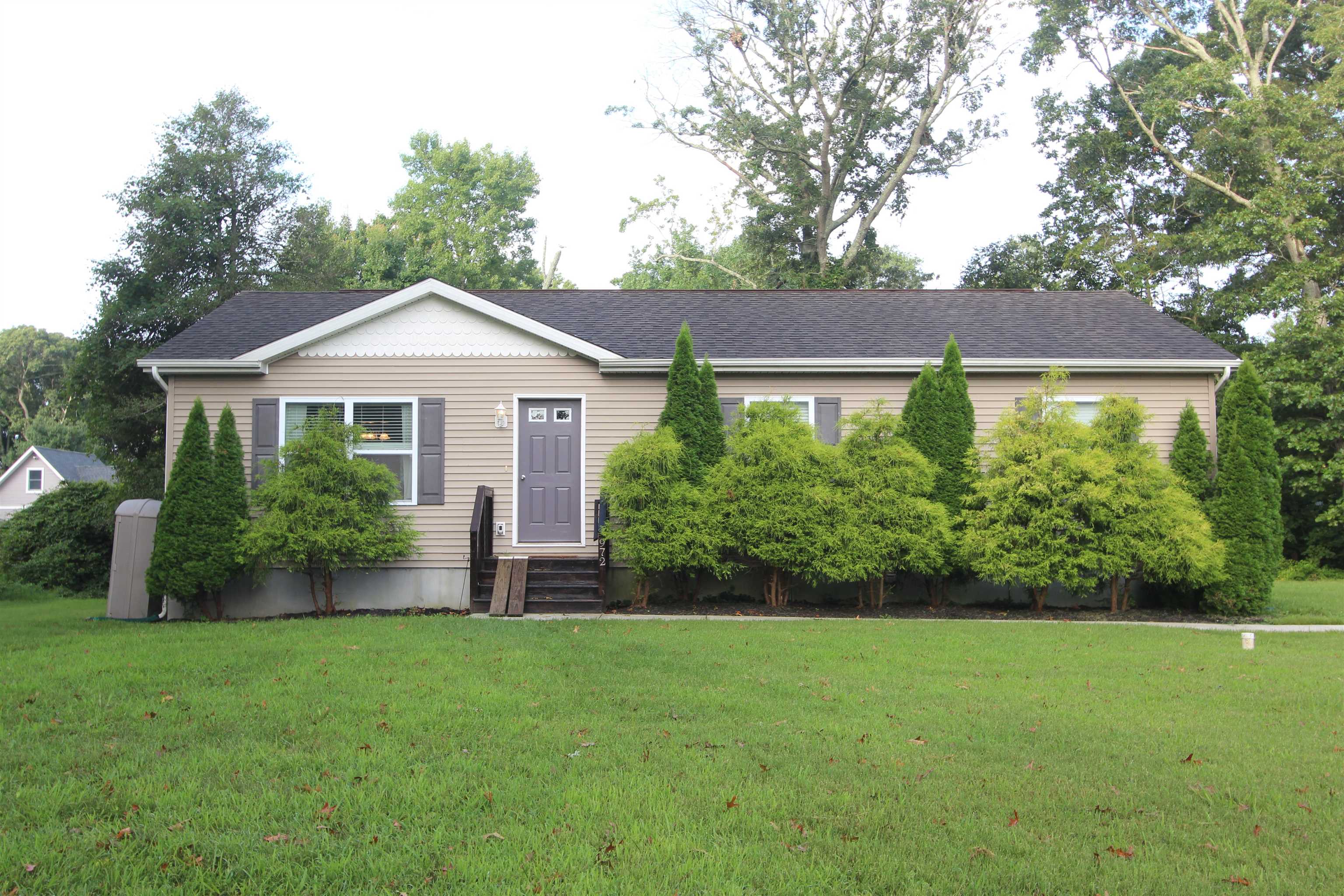 972 Tecumseh Road Erma, NJ 08204 - Photo 3 of 30 a front view of a house with a yard