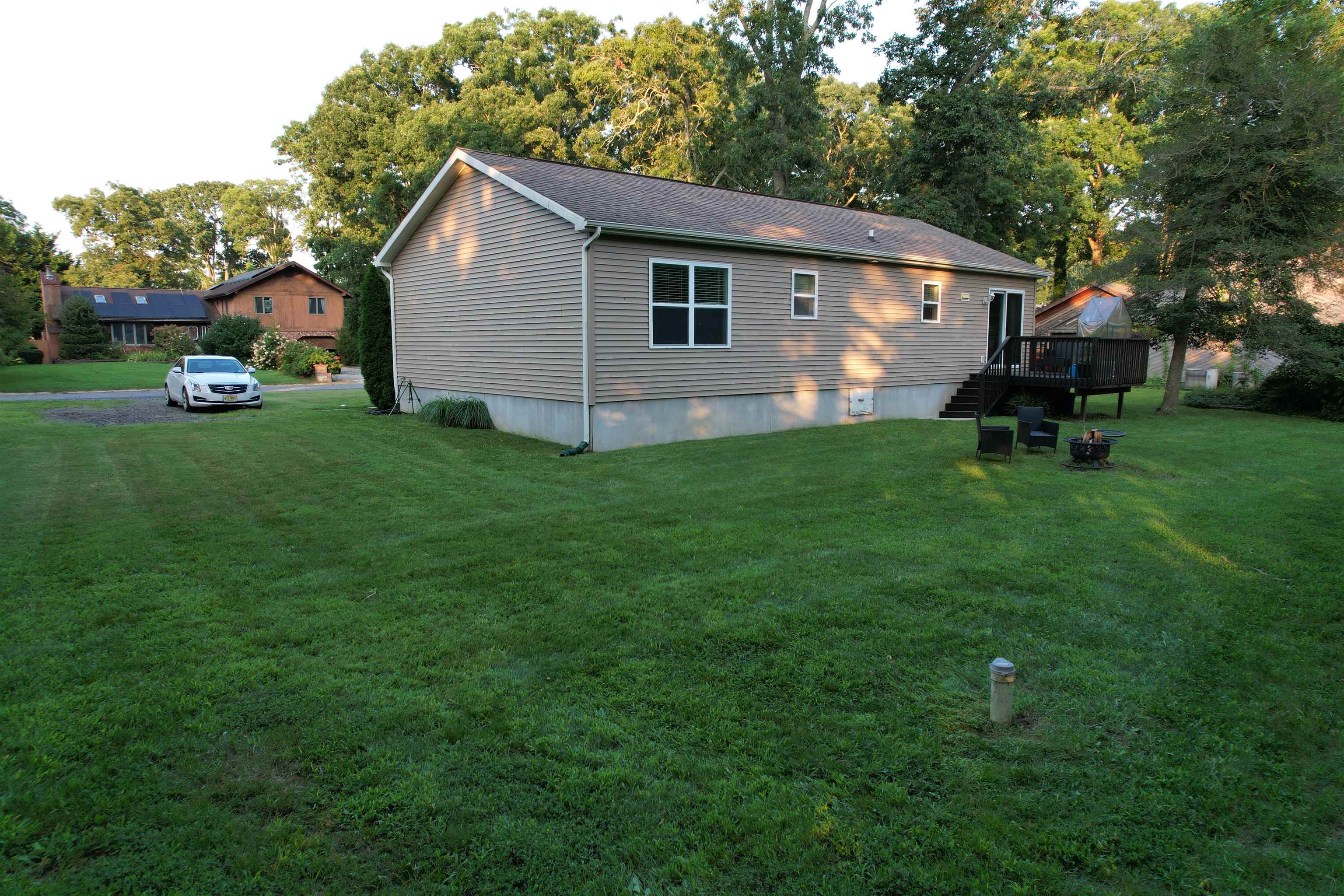 972 Tecumseh Road Erma, NJ 08204 - Photo 8 of 30 a view of backyard of house with green space