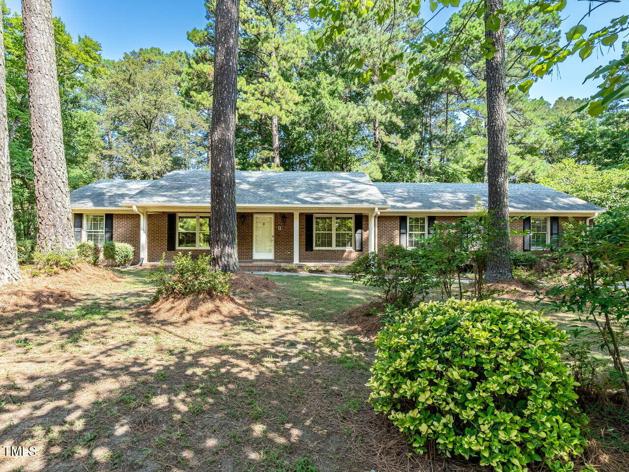 6600 Barbee Road Durham, NC 27713 - Photo 2 of 33 a front view of a house with a yard