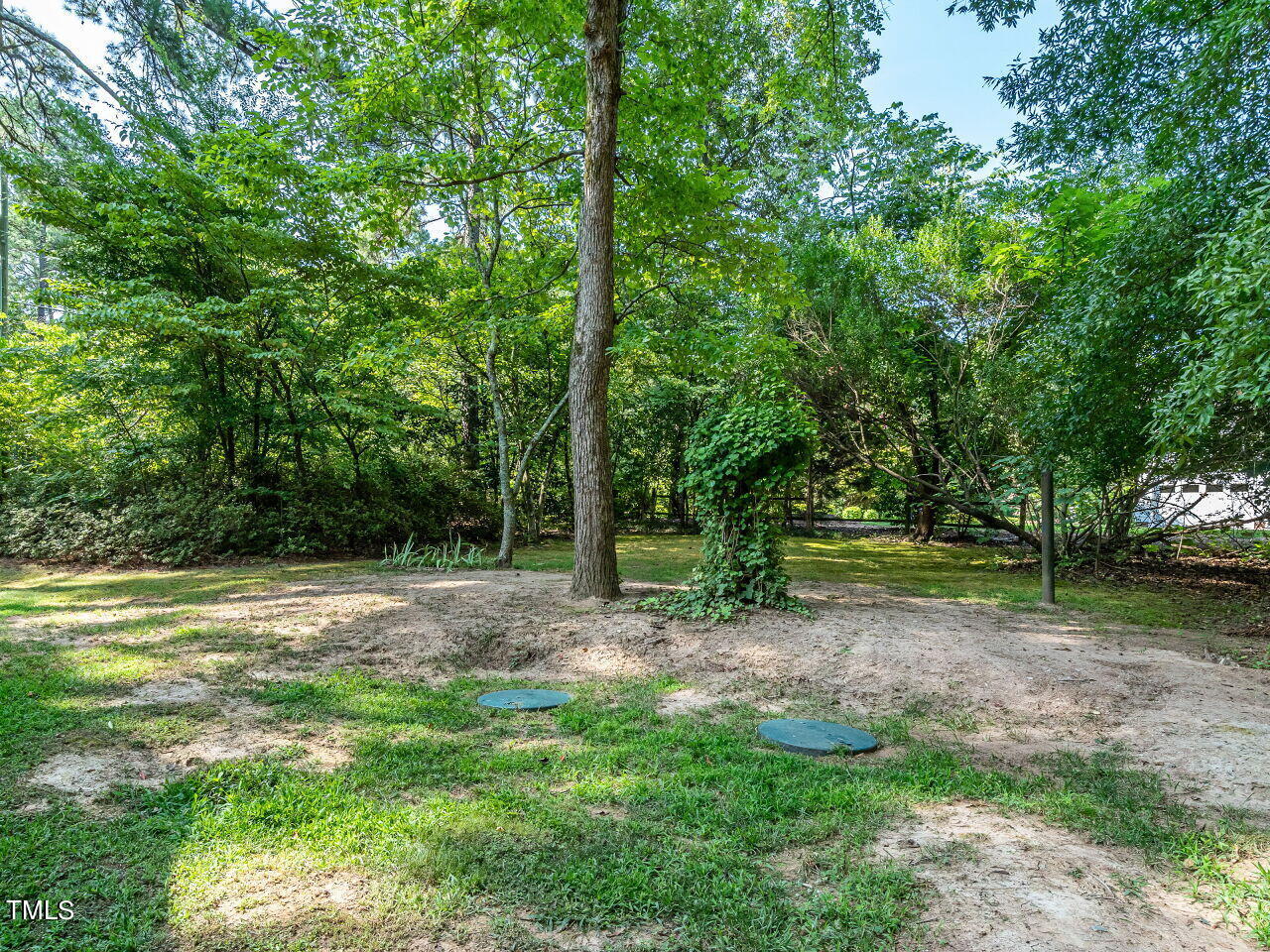 6600 Barbee Road Durham, NC 27713 - Photo 29 of 33 a view of outdoor space with trees all around