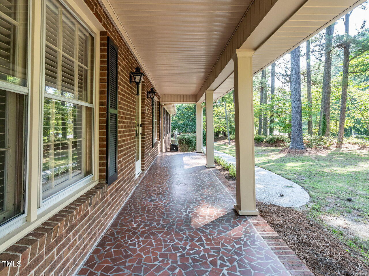 6600 Barbee Road Durham, NC 27713 - Photo 3 of 33 a view of a pathway with a house in the backyard