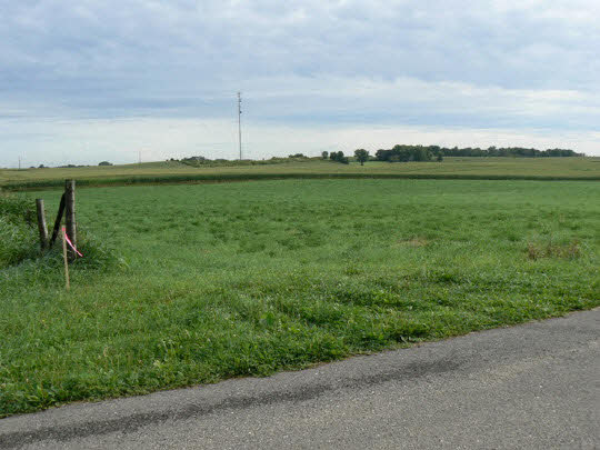 12908 Harvey Road Morrison, IL 61270 - Photo 2 of 3 a view of a golf course with a lake