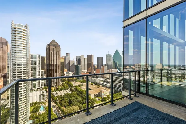 a view of a bathroom with a sink and a mirror
