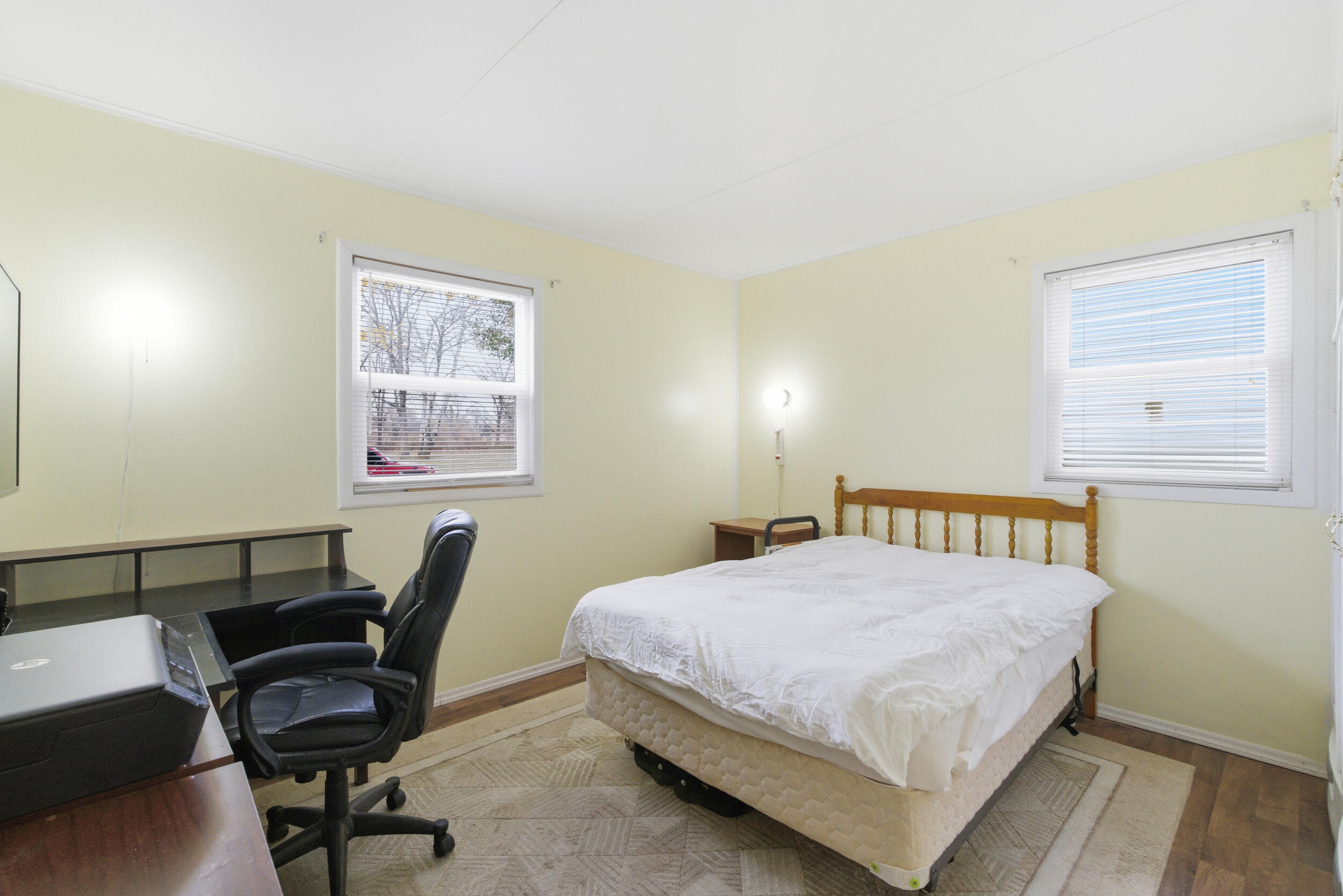 1678 174th Place Hammond, IN 46324 - Photo 12 of 18 a bedroom with a bed and a desk