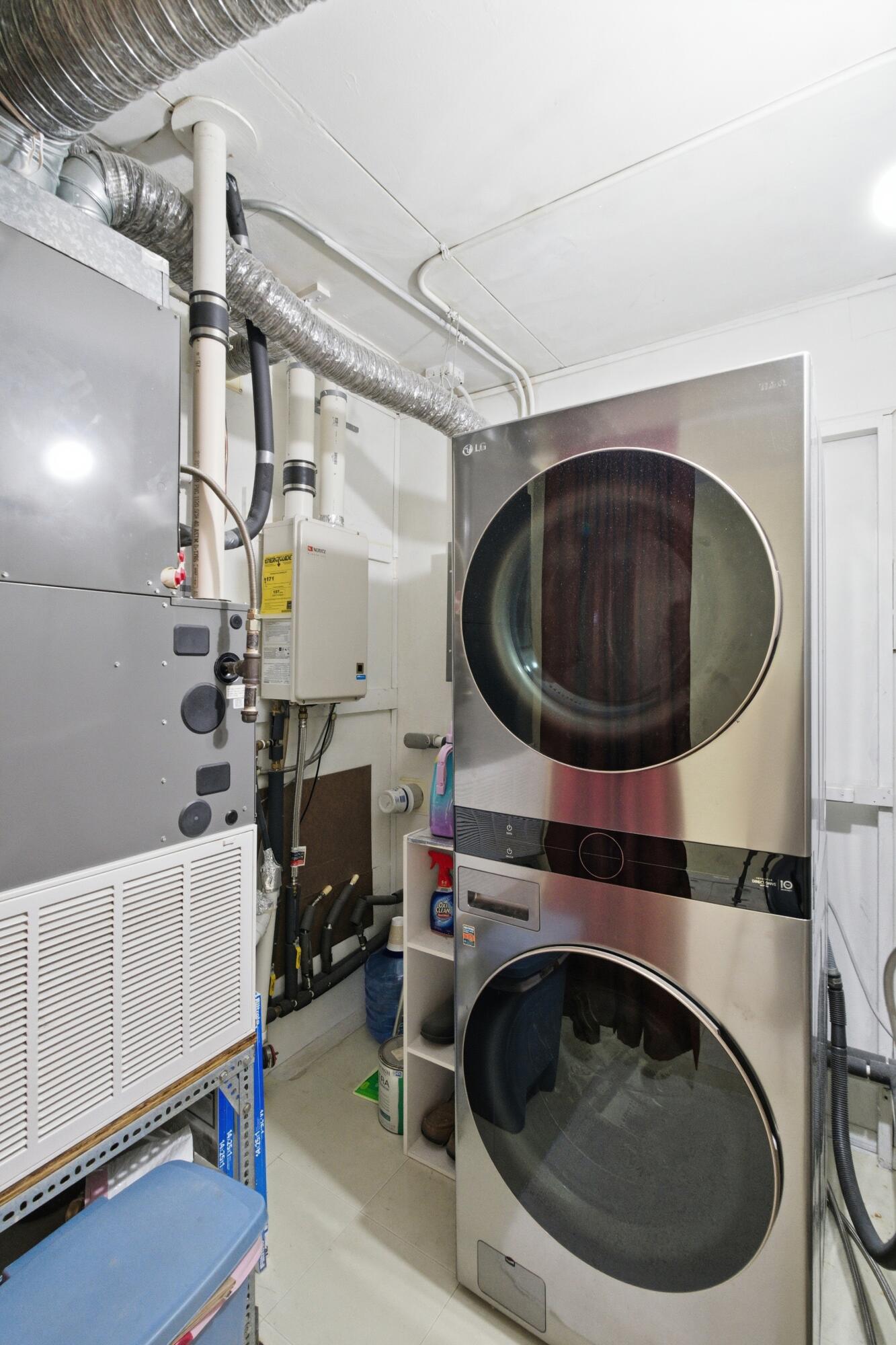 1678 174th Place Hammond, IN 46324 - Photo 15 of 18 a utility room with dryer and washer