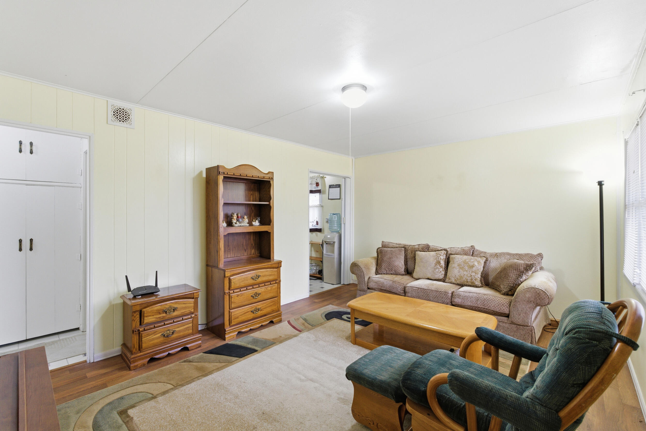 1678 174th Place Hammond, IN 46324 - Photo 3 of 18 a living room with furniture and a flat screen tv