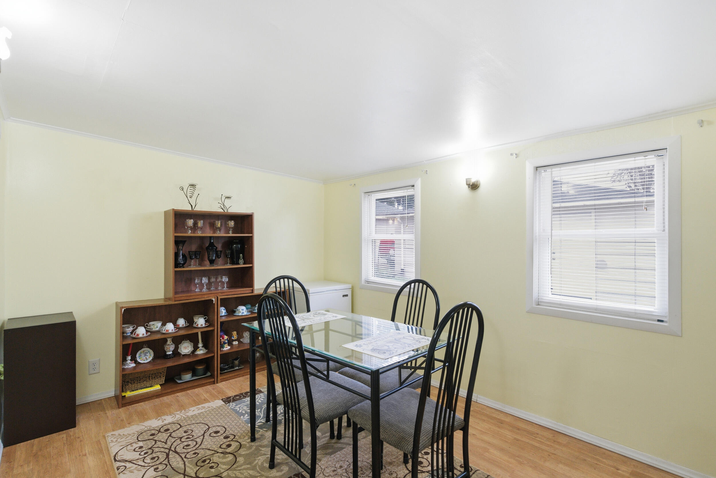 1678 174th Place Hammond, IN 46324 - Photo 10 of 18 a view of a dining room with furniture and chandelier