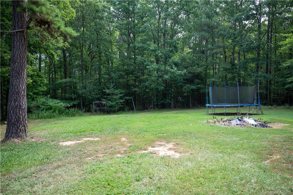 1824 Reservation Road Rock Hill, SC 29730 - Photo 14 of 24 a view of a backyard with a trampoline