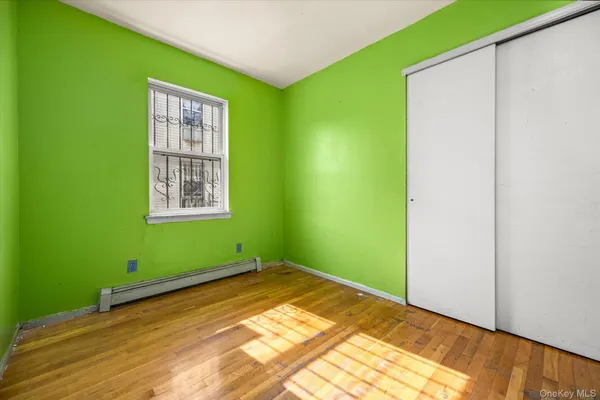 a view of room with window and entryway
