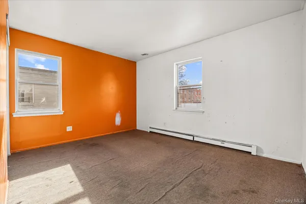 an empty room with windows