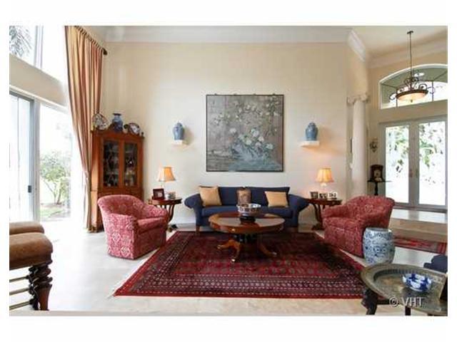 7096 Vía Marbella Boca Raton, FL 33433 - Photo 3 of 16 a living room with furniture a rug and a large window