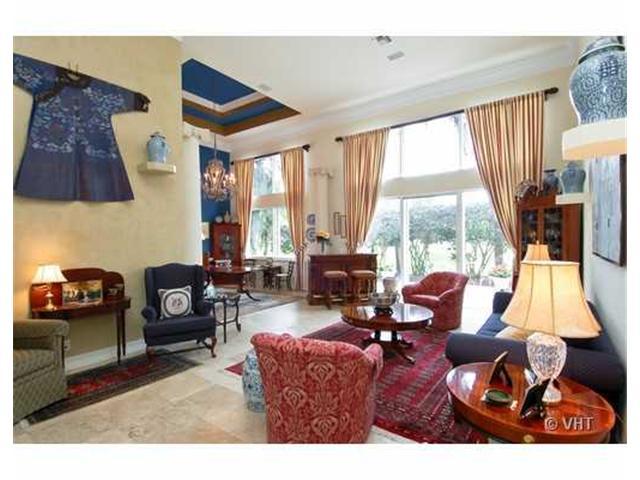 7096 Vía Marbella Boca Raton, FL 33433 - Photo 4 of 16 a living room with furniture and large window